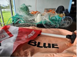 Department of Land and Natural Resources (DLNR) Division of Aquatic Resources (DAR) Education Specialist John Kahiapo’s table of visual aids for a class on fishing regulation at Wailoa Station in Hilo, Hawai‘i Island, on Monday, November 11, 2025.