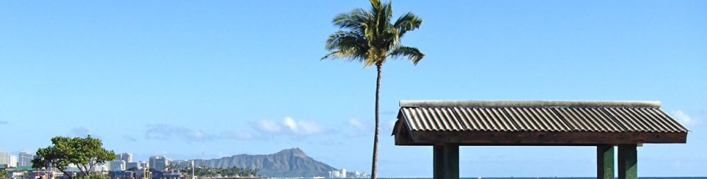 picnic table on beach with view of diamond head