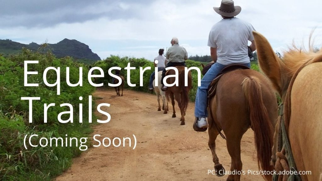 An image of horseback riding with the words Equestrian Trails (Coming Soon)